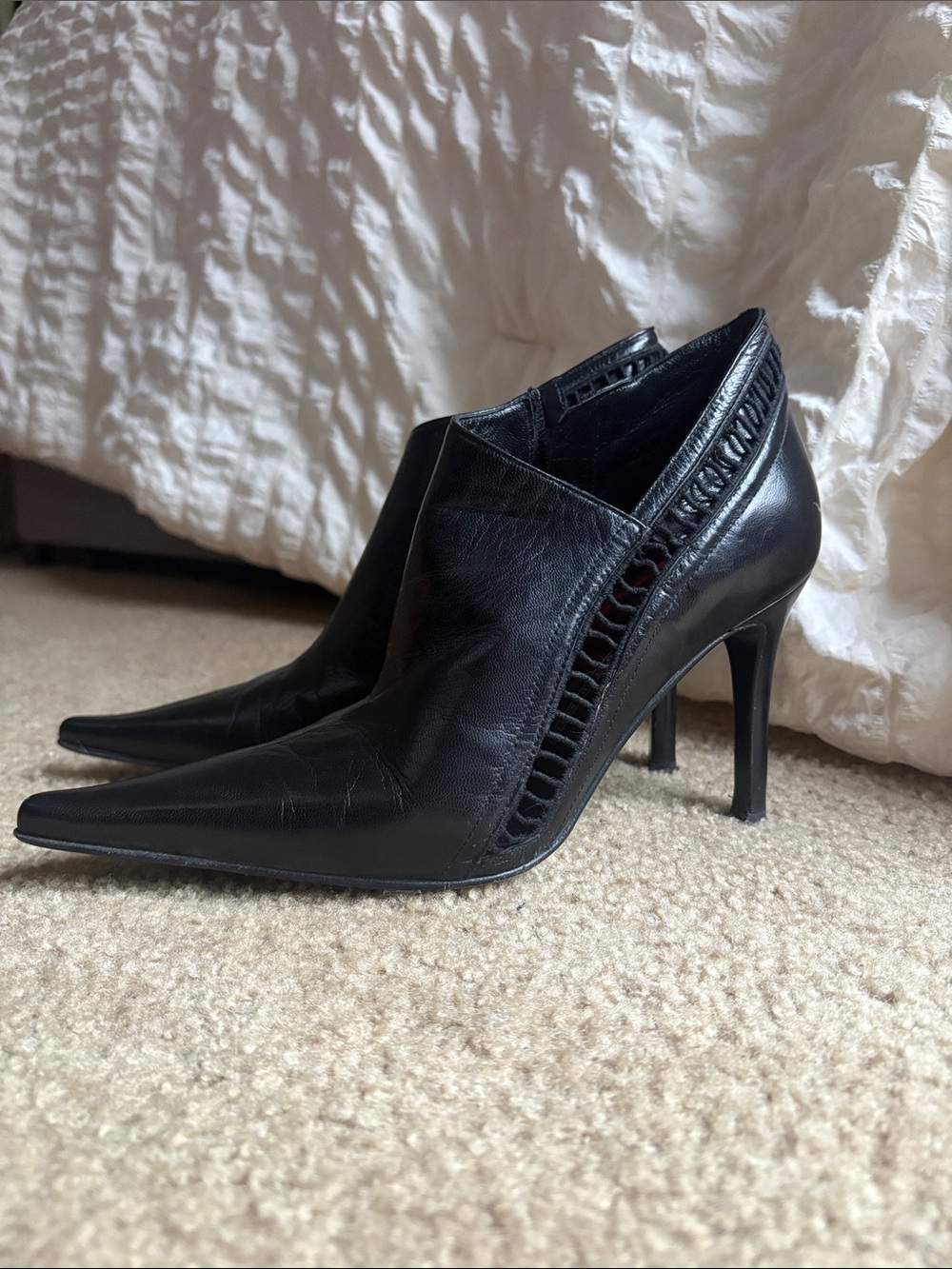 Giuseppe Zanotti Black Pointed Leather Ankle Boots with Red Insole